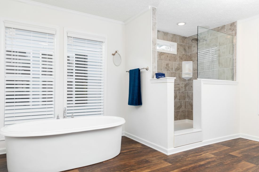 The 1321 CLASSIC Primary Bathroom. This Manufactured Mobile Home features 4 bedrooms and 2 baths.