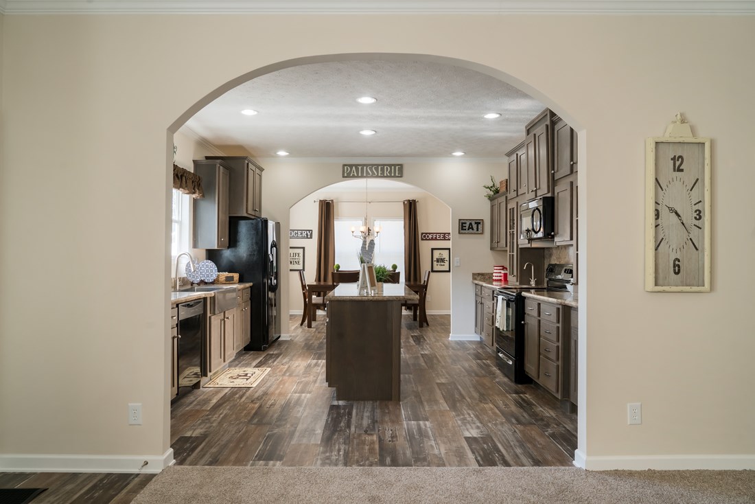 The 2062 CLASSIC Dining Area. This Manufactured Mobile Home features 3 bedrooms and 2 baths.