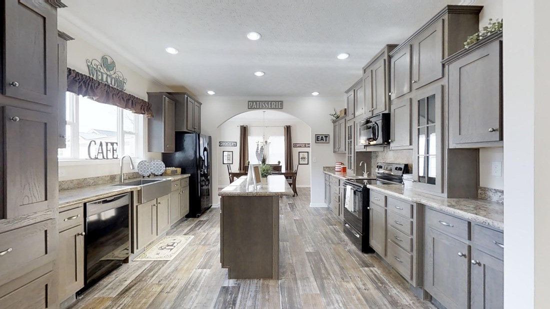The 2062 CLASSIC Kitchen. This Manufactured Mobile Home features 3 bedrooms and 2 baths.