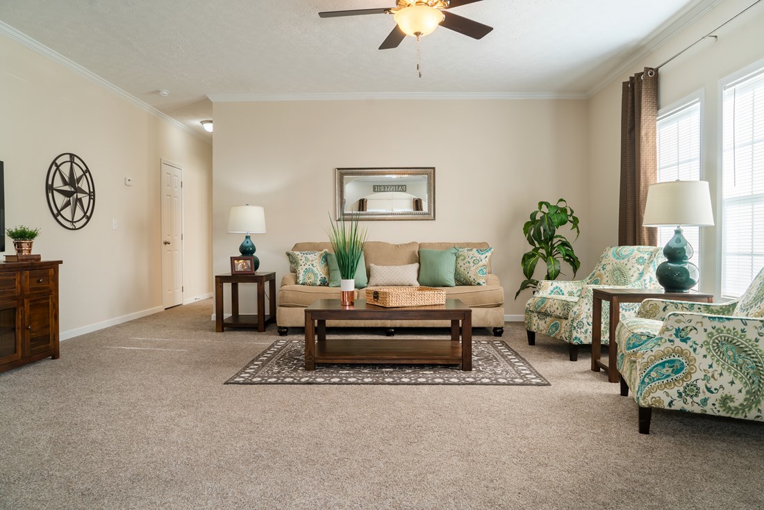 The 2062 CLASSIC Living Room. This Manufactured Mobile Home features 3 bedrooms and 2 baths.