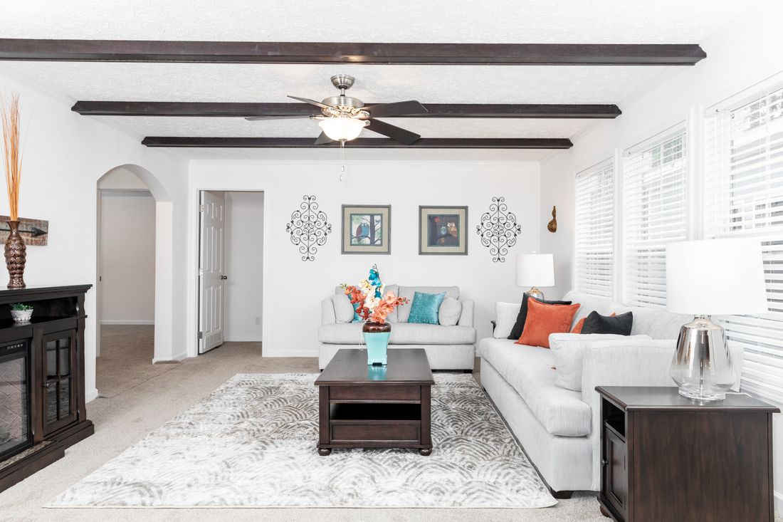 The 3321 CLASSIC Family Room. This Modular Home features 4 bedrooms and 2 baths.